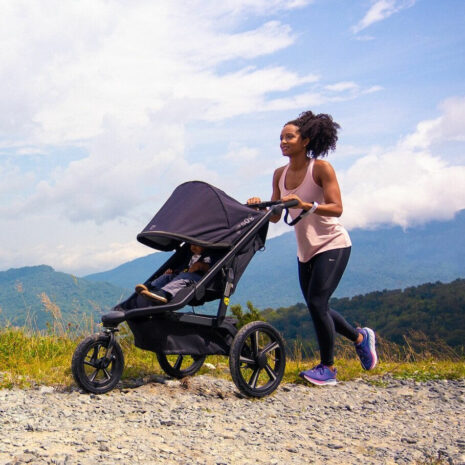 mom jogging with all terrain stroller